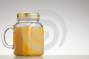Orange smoothie in jar