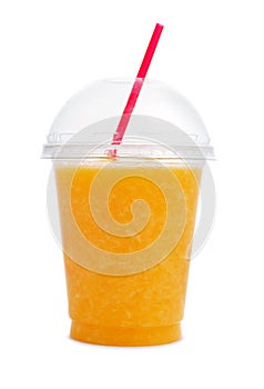 Orange smoothie in plastic cup