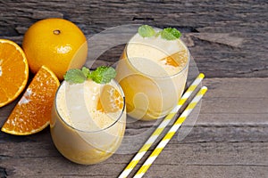 Orange smoothies yellow colorful fruit juice milkshake blend beverage healthy.