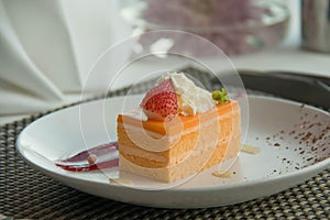 Orange Sponge Cake on a white plate