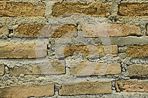 Orange square brick building strong wall cement background home decor grunge textured. interior stone design rugged surface in ful