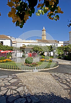 Orange Square in Estepona Spain with pretty gardens and flowers photo