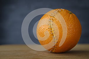 Orange with stainless steel sutures