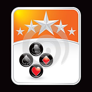 Orange star backdrop with playing card suits