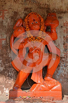 Orange Statue of Lord Hanuman, the Hindu Monkey Deity in Varanasi, India