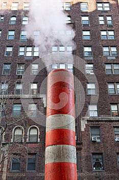 Orange Steam Pipe in Midtown Manhattan of New York City