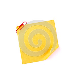 Orange sticky paper note with a red clip