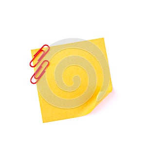 Orange sticky paper note with red clips