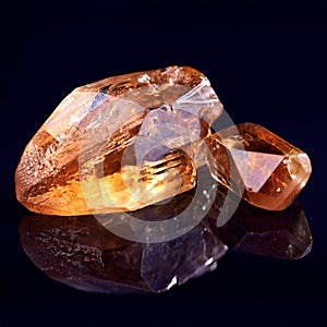 Orange stone, jewel studio by black background for natural resource, garnet or sparkle for luxury. Rock, gemstone or