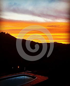 An orange  sun riase moment  pool