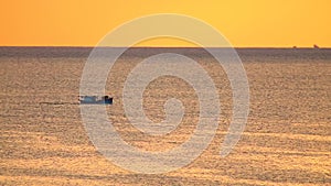 Orange Sunrise Traveling Fishing Boat HD Footage