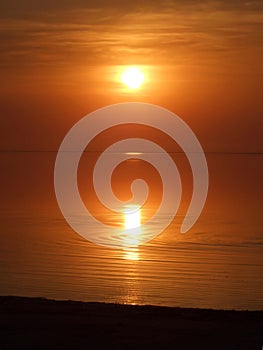 Orange sunset above a gulf