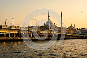 Orange sunset over the New Mosque Fatih in Turkey