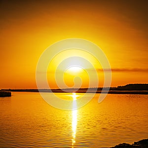 Orange sunset over river