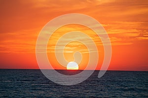Orange Sunset on the sea horizon. photo