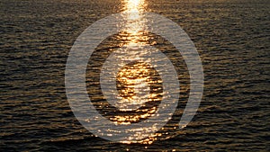 orange sunset sun reflected on the sea water surface