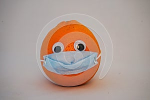 arancio con maschera chirurgica photo