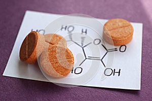 Orange tablets of Ascorbic acid or vitamin c.