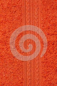 Orange terry towel background. Terry cloth texture