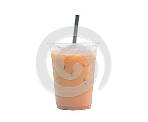 Orange Thai iced condensed milk tea in transparent plastic glass with straw isolated on white background with clipping path