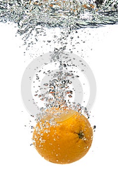 Orange thrown into water