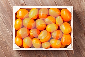Orange tomatoes box