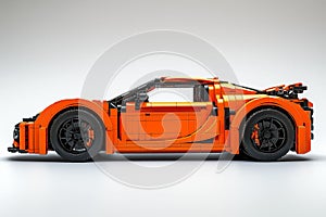 Orange toy car model made of bricks.
