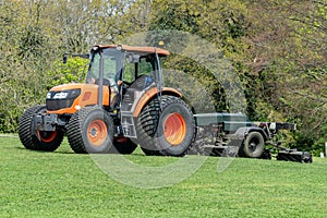 Orange tractor lawnmower