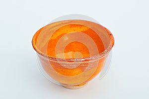 Orange traditional japanese pottery cup