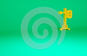 Orange Train traffic light icon isolated on green background. Traffic lights for the railway to regulate the movement of