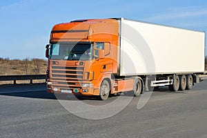 Orange truck with white container