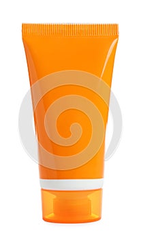 Orange tube with sun protection body cream on white background