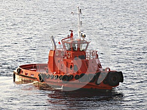 Orange tug/pilot boat