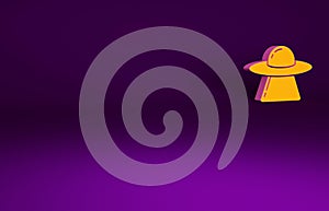Orange UFO flying spaceship icon isolated on purple background. Flying saucer. Alien space ship. Futuristic unknown