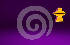 Orange UFO flying spaceship icon isolated on purple background. Flying saucer. Alien space ship. Futuristic unknown