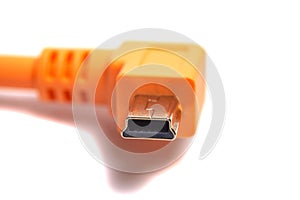 Orange USB cable isolated on white background