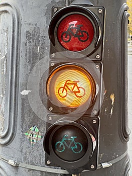 Orange vertical bicycle traffic light