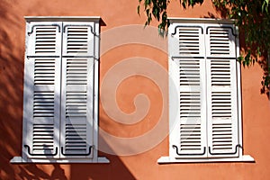 Orange wall house white shutters, Neve Tzedek, Tel Aviv photo