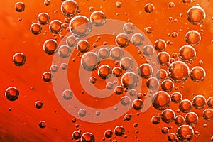 Orange water, air and oil mixed for a bubbly effect