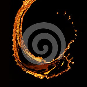 Orange water splash isolated on black