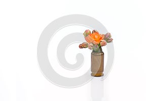 Orange watercolor flower into a riffle bullet symbolizing flower