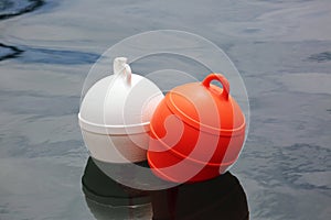 Orange And White Buoys