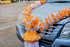 Orange. and white curtains Made flowers tied