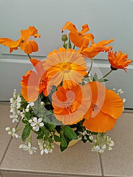 orange and white flowers in bouquet