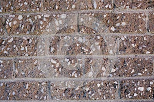 Orange and white spotted brick wall background