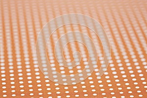 Orange and white spotted surface