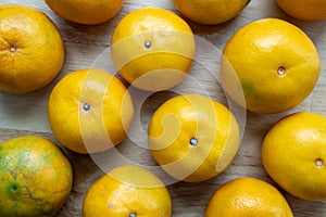 Orange on wooden background