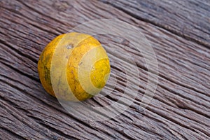 The orange on wooden background