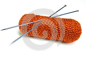 Orange yarn - knitting needles