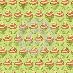 Orange yellow cupcake in green background